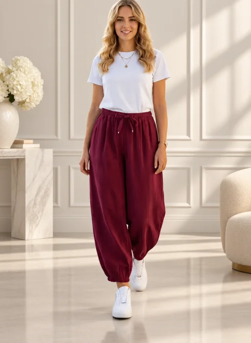 Pantaloni tip balon din catifea raiata cu talie elastica si buzunare, bordo
