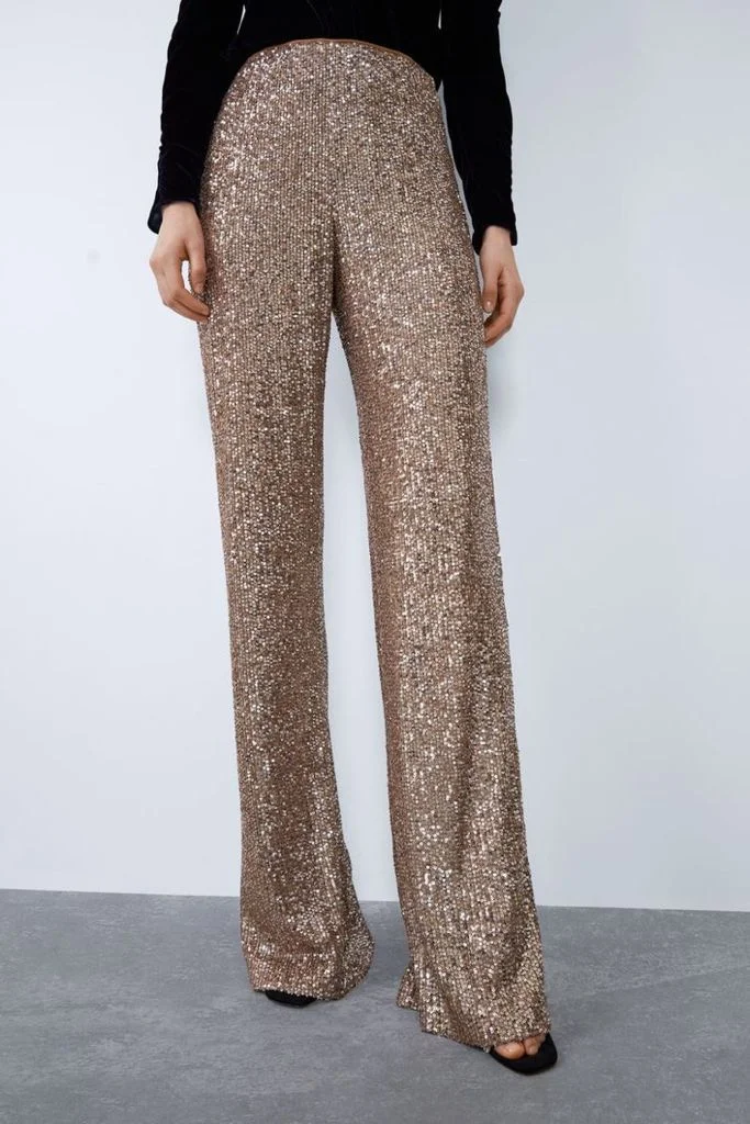 Pantaloni eleganti din paiete aurii