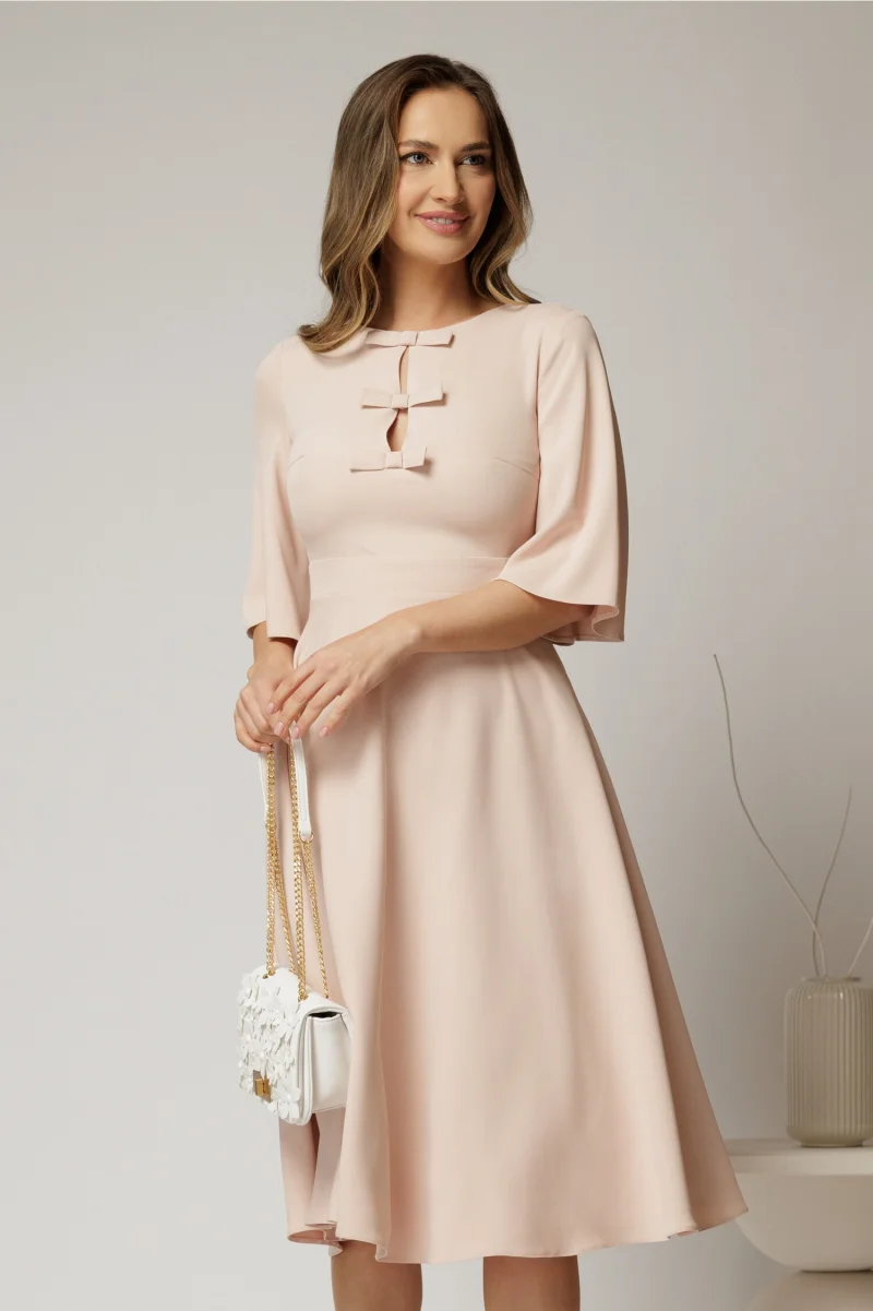 Rochie DY Fashion midi roz cu maneci evazate si funde pe bust