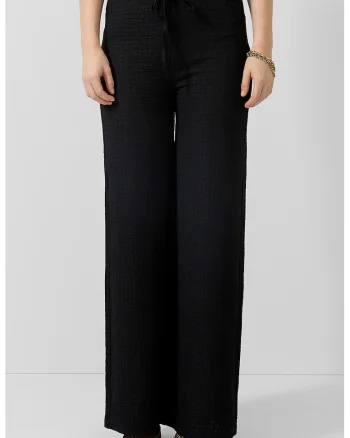 Pantaloni cu croiala ampla si snur de ajustare