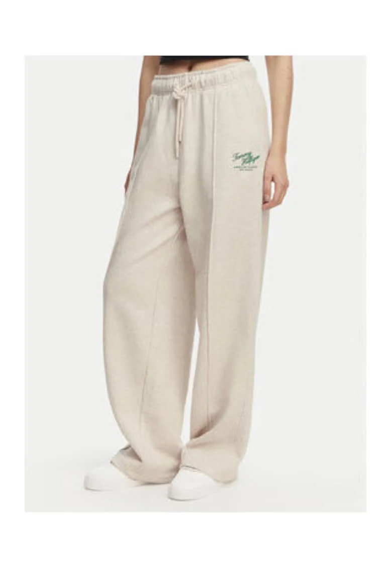 Pantaloni de trening cu croiala ampla si detaliu logo