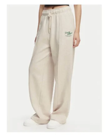 Pantaloni de trening cu croiala ampla si detaliu logo