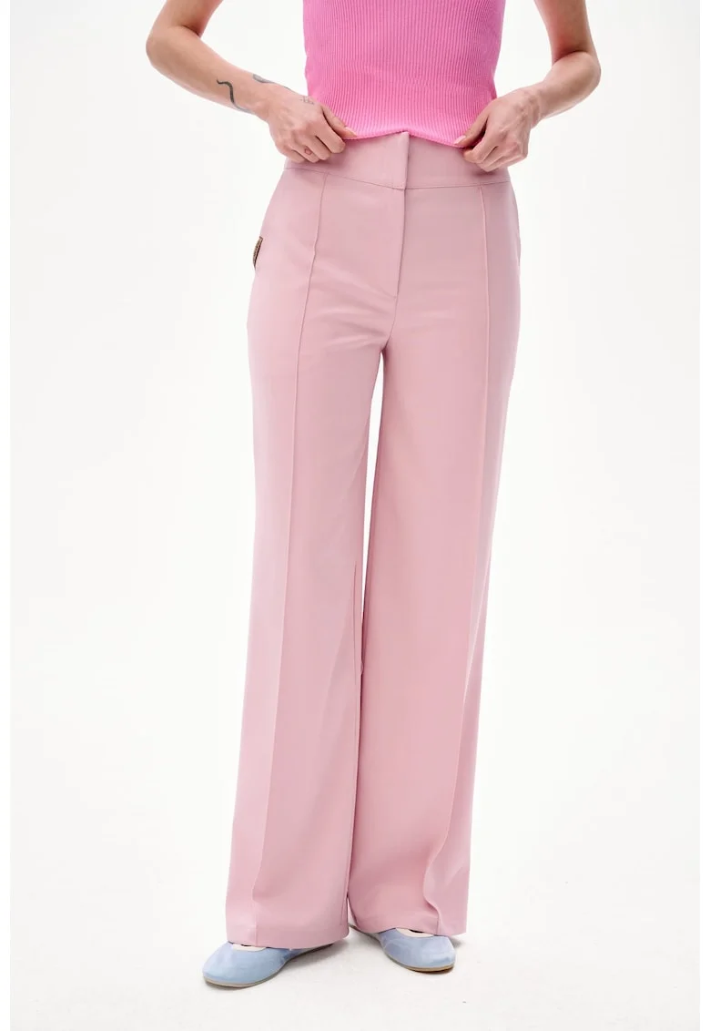 Pantaloni cu buzunare oblice