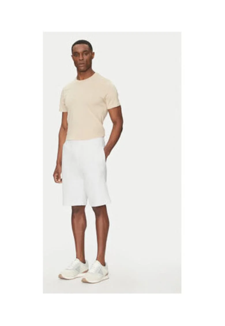 Pantaloni scurti uni din bumbac cu buzunare laterale