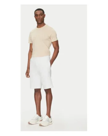Pantaloni scurti uni din bumbac cu buzunare laterale