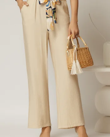 Pantaloni bej din viscoza cu croi lejer si cordon cu print