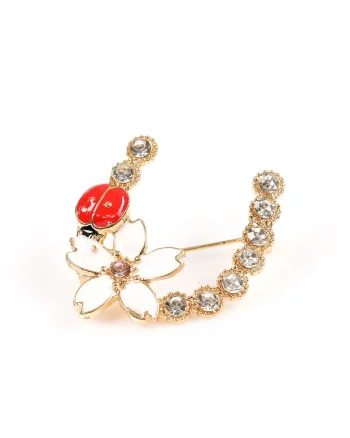 Brosa martisor potcoava cu floare alba si buburuza