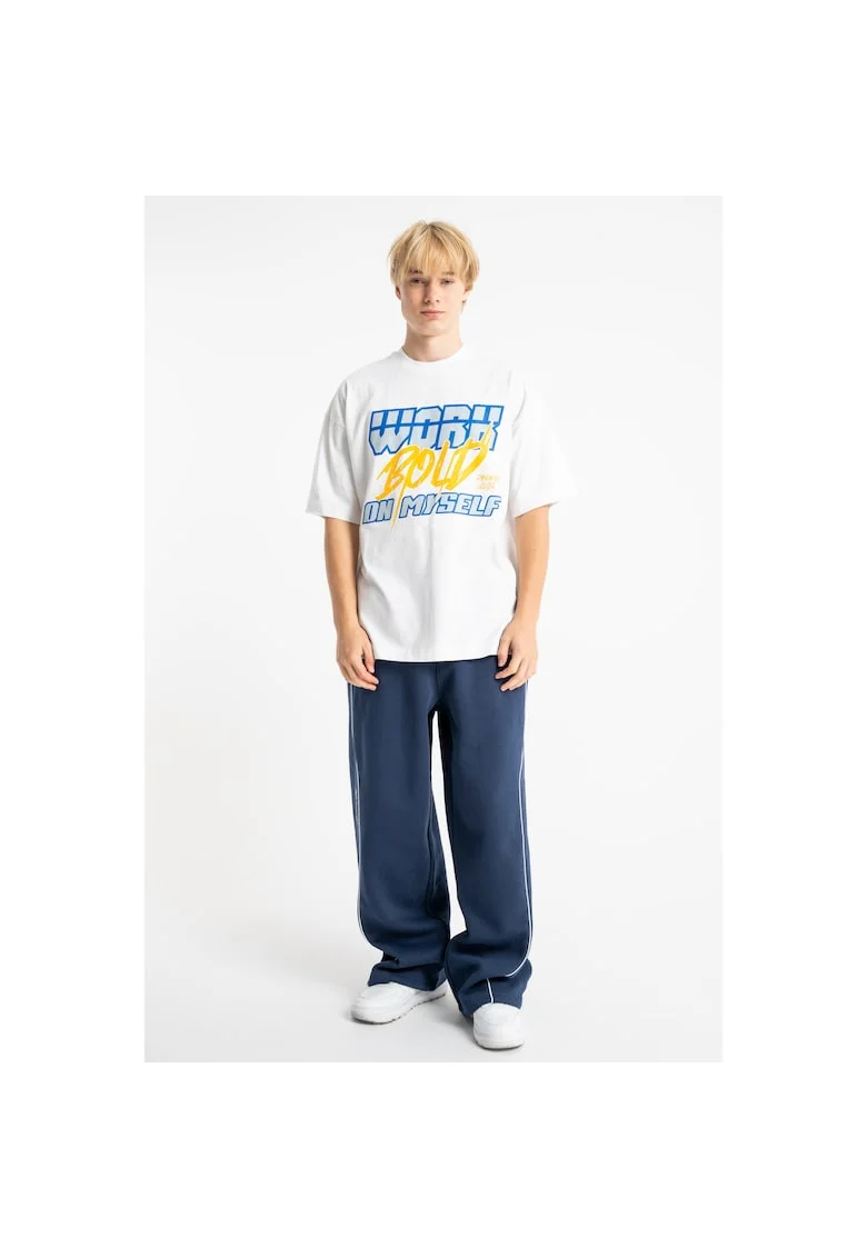 Pantaloni de trening cu talie ajustabila si croiala ampla
