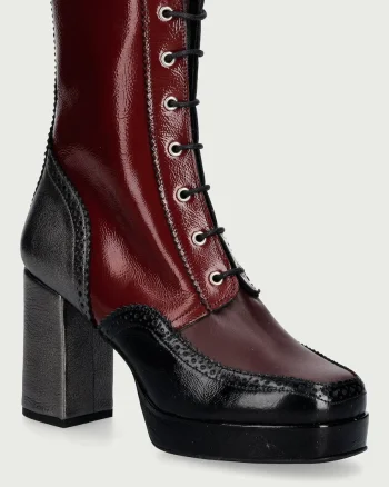 Fly London  botine cu toc pentru femei din piele ELUN563FLY